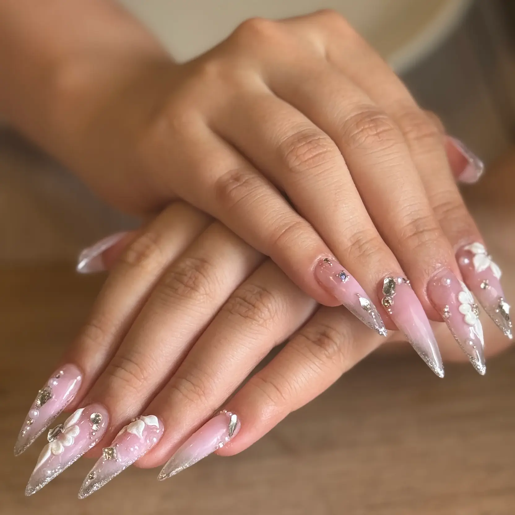 Crystal details on pink stiletto nails at Kanita Nail Lounge