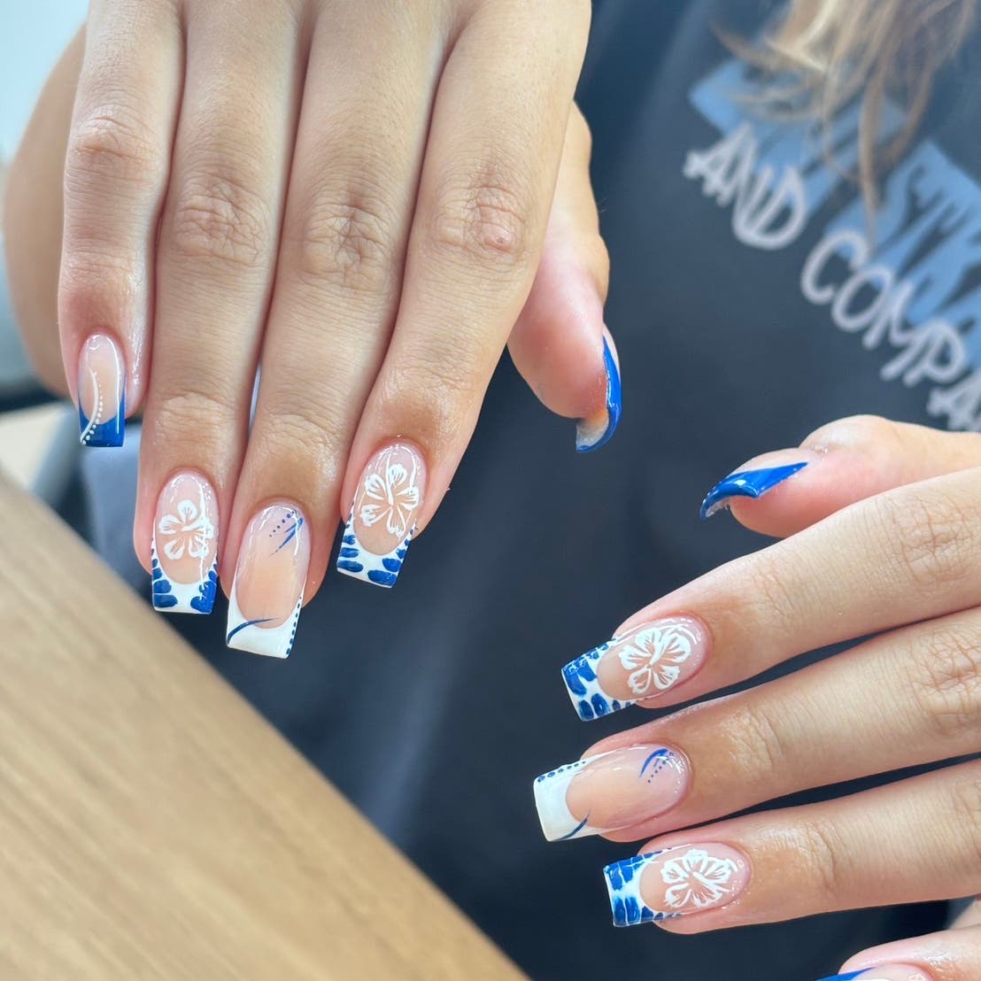 White and blue floral nail art