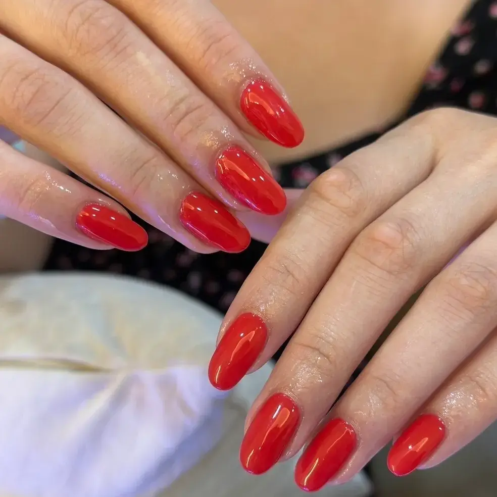 Glossy red gel manicure