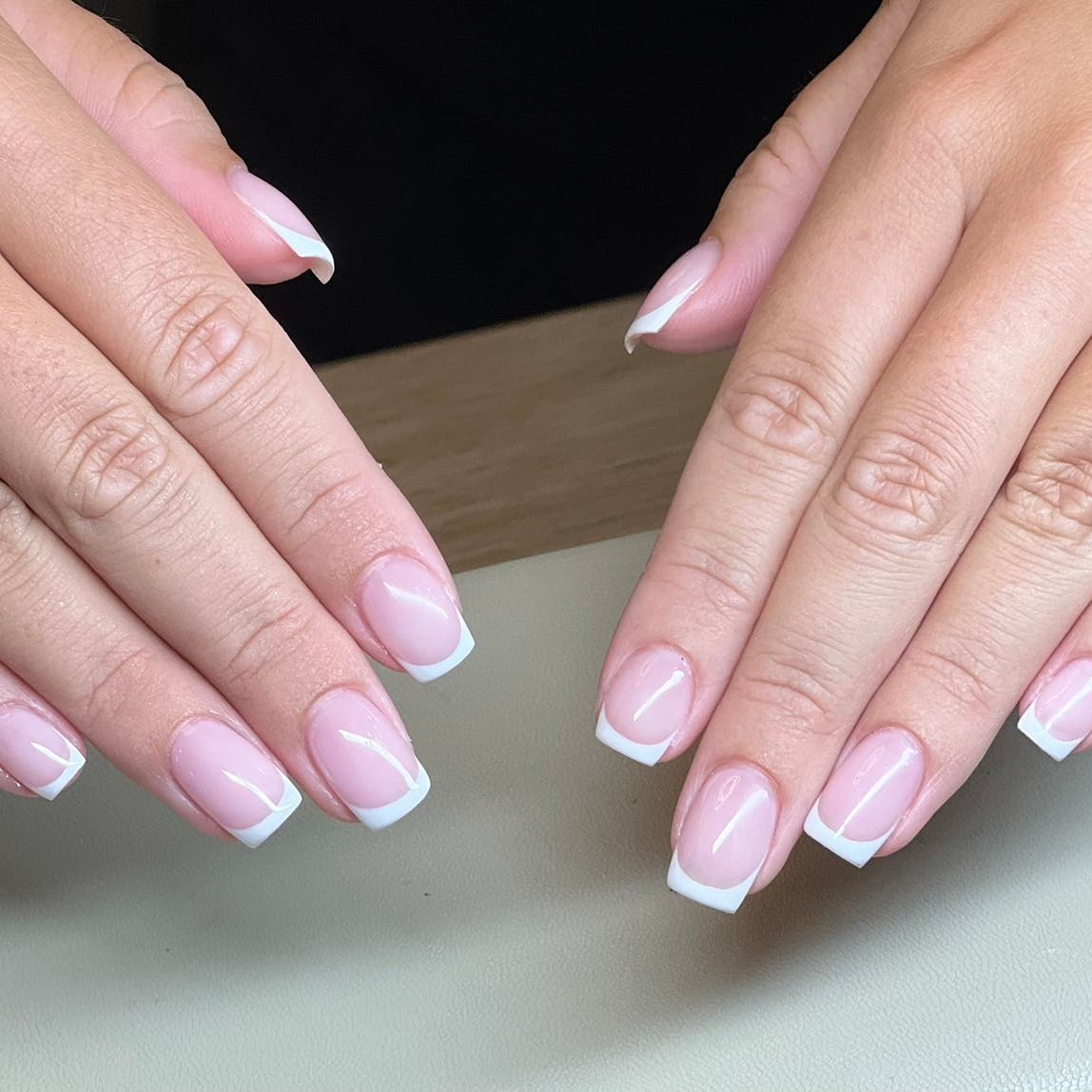 Soft pink French manicure with crisp white tips