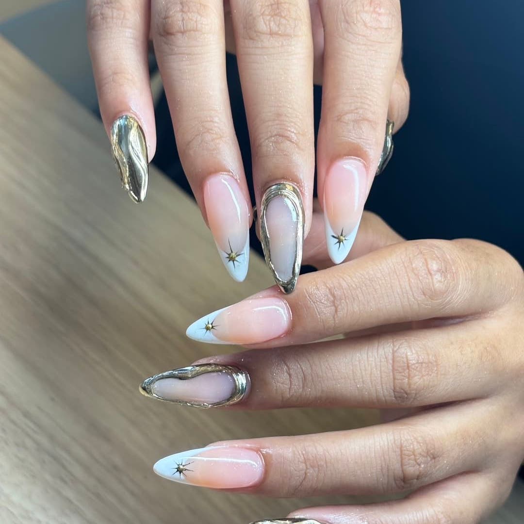Silver chrome nail art with star details