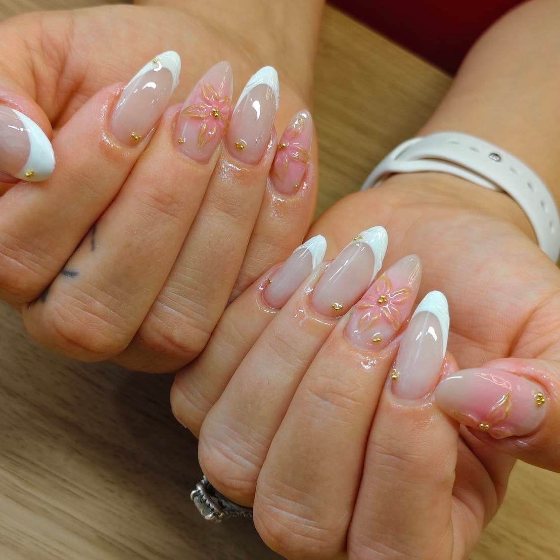 French tips with delicate floral designs