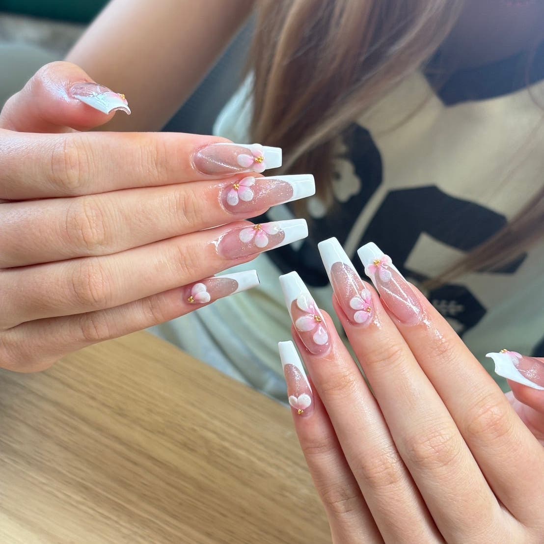 Soft pink cherry blossom nail art
